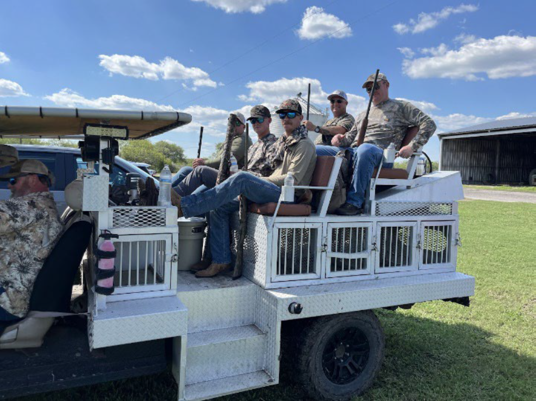 Coast Guard staff on a small truck.