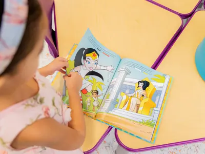 Little Girl Reading a Book