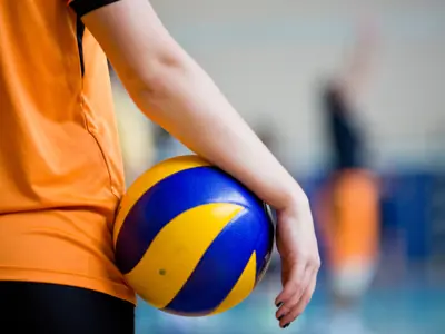 woman holding volleyball