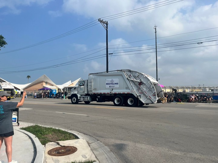 A SWS Recycling Truck drives by during the Buc Days Parade.